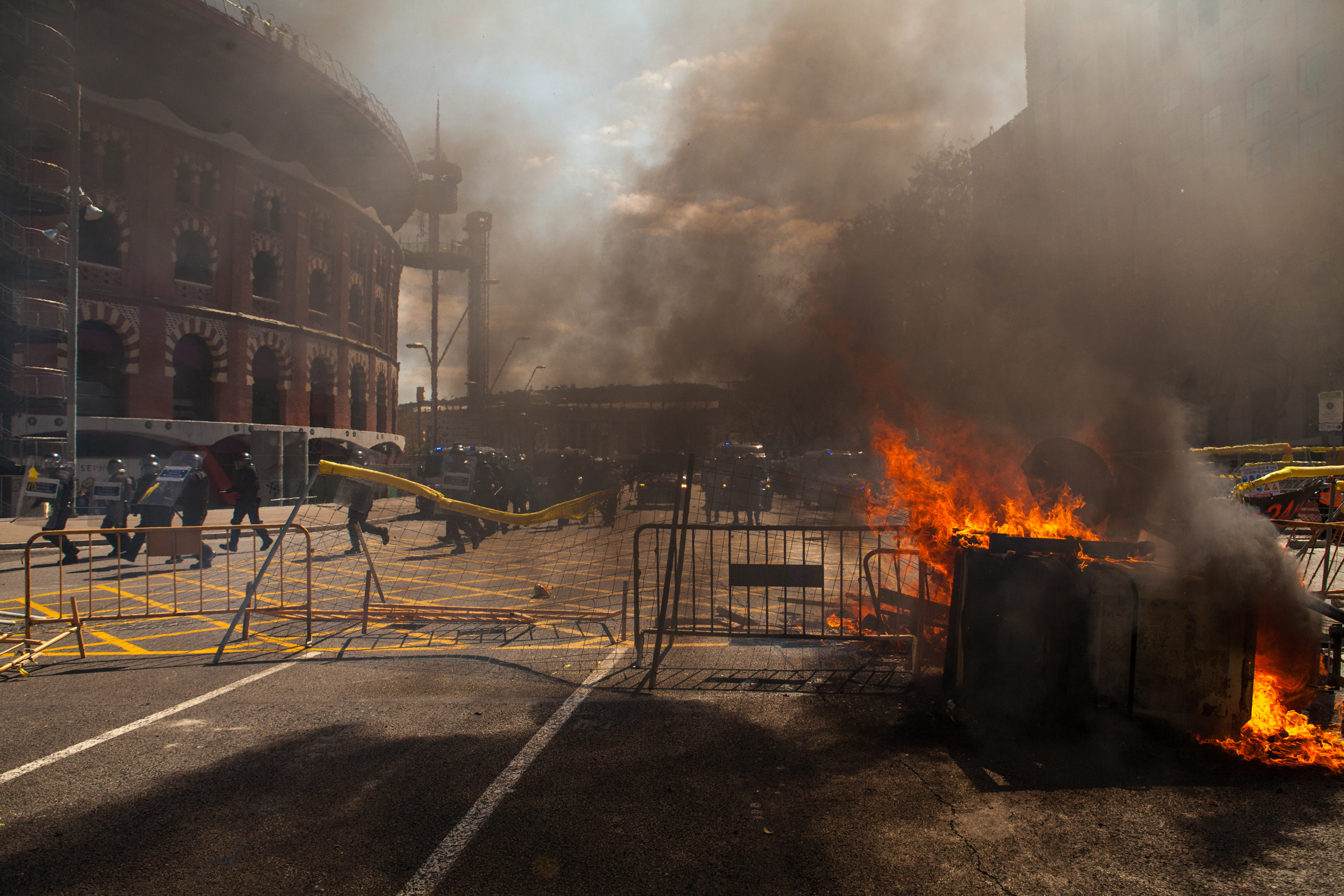 Catalan police charging the antifascist group. Barcelona