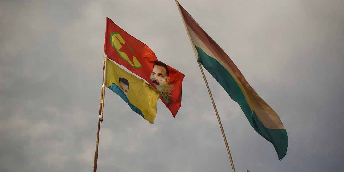 1200px-PKK_flags_and_Kurdistan_Regional_Government_flag_flying_over_Kirkuk_02